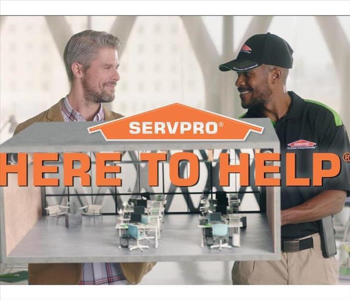 Two men looking at each other with "here to help" text in front of them 